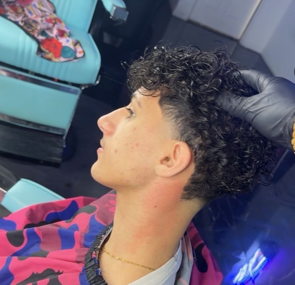 Curly top fade