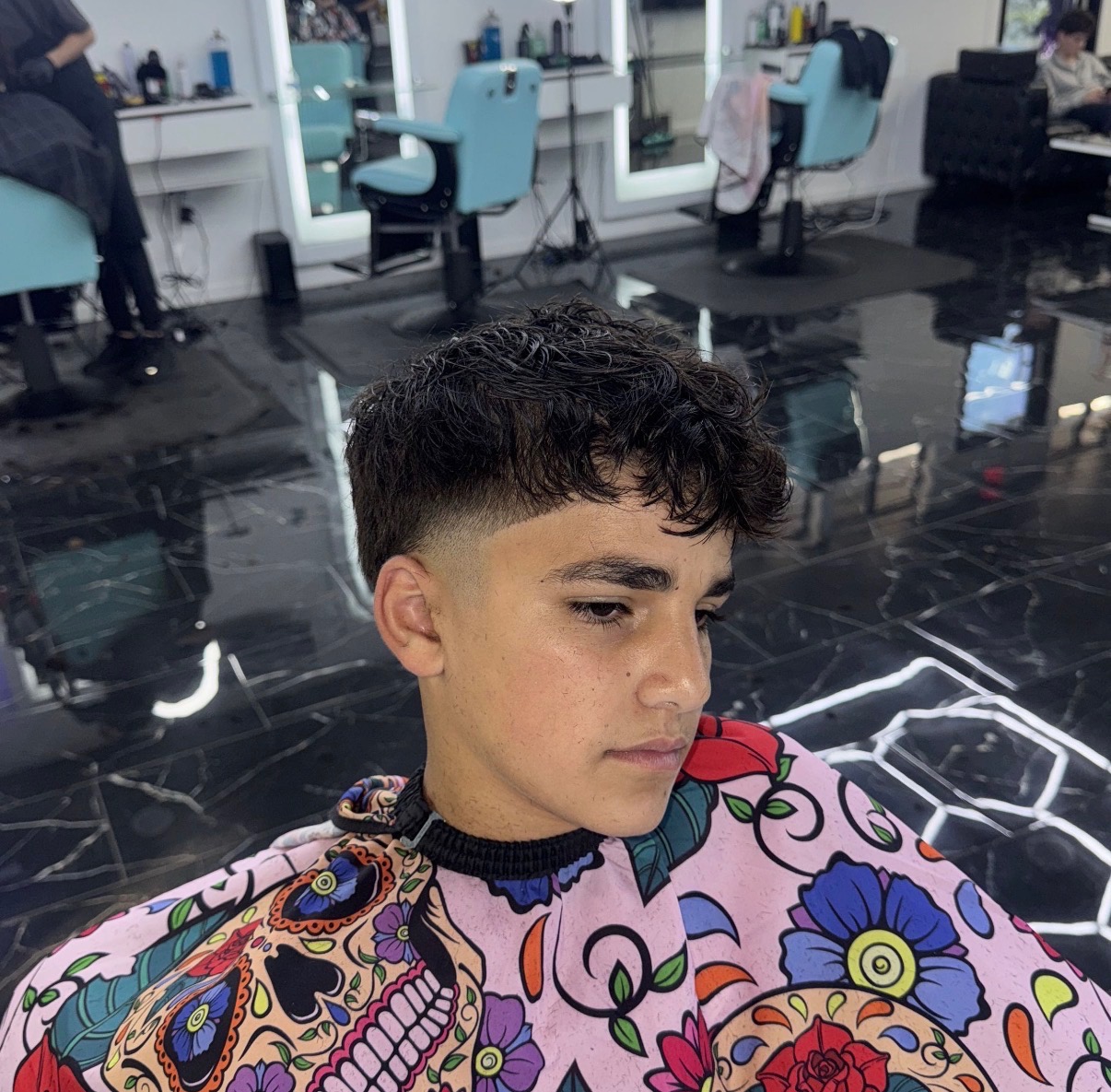 Curly crop with mid fade